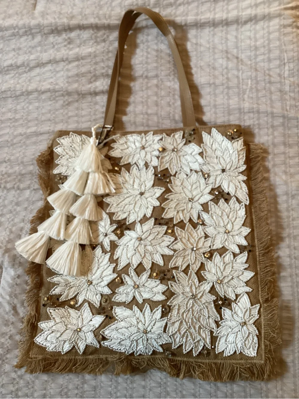 ANTHROPOLOGIE IbBan Beige Floral Appliqué Tote with Tassel Accent. NWT